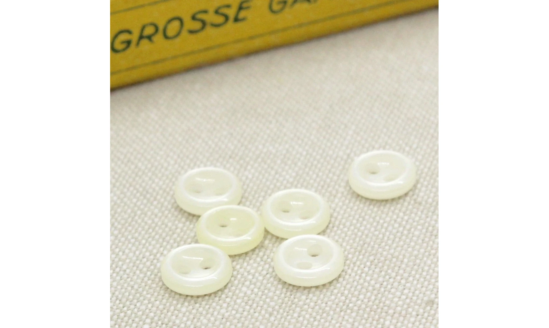 10 boutons / 9MM / Blanc