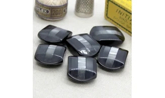 6 Boutons / 27MM / ovoide Noir et nacre