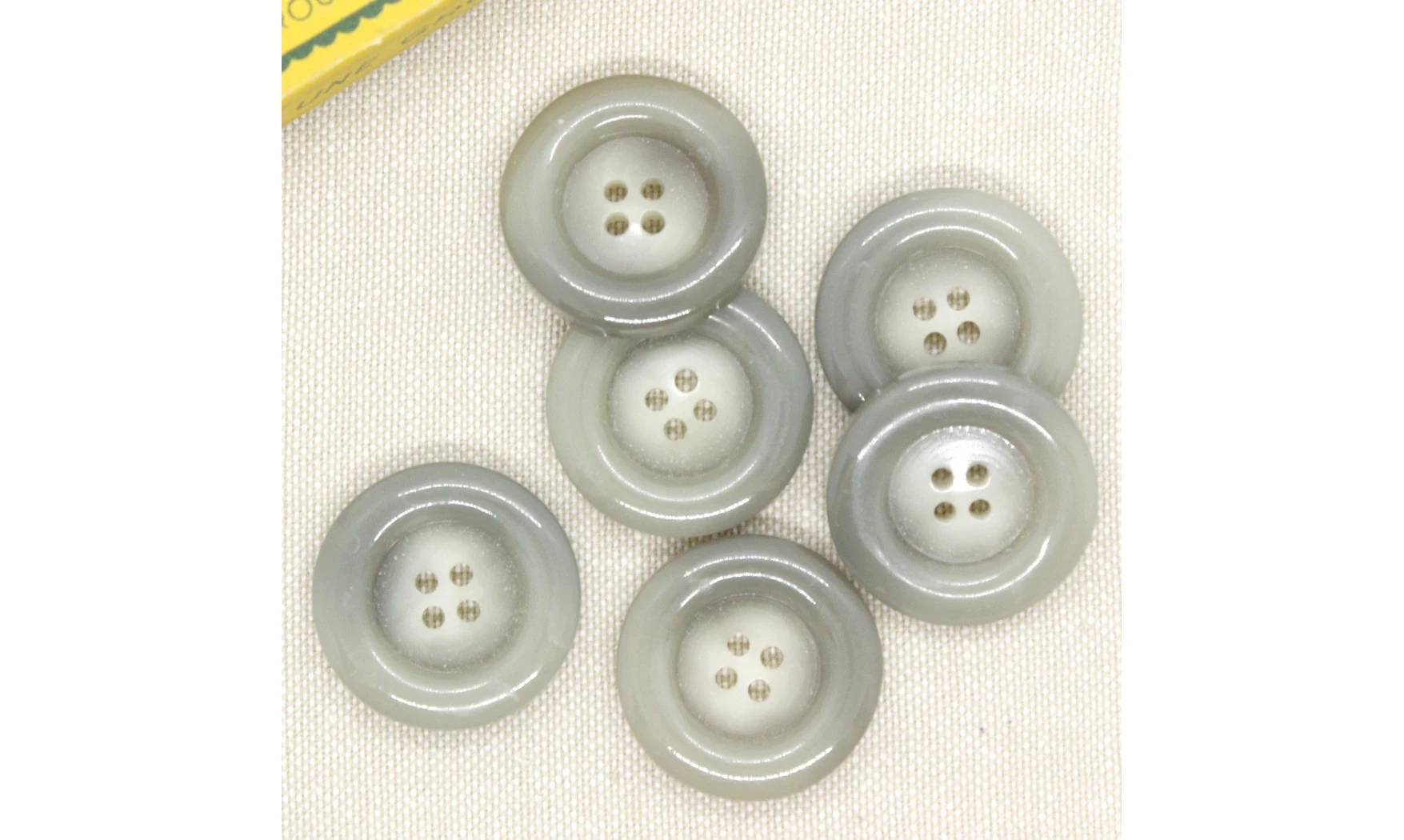 6 boutons / 27MM / Gris